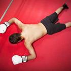 Un boxeur avec des gants blancs gisant sur le sol