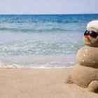 Sable bonhomme de neige sur la plage